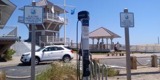 Electric vehicle charging station at beach